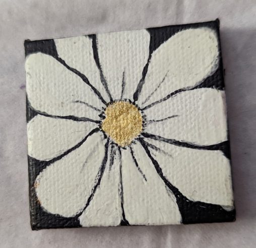 A painting of a white daisy with a gold Center at an extreme Zoom done on a 2-in by 2-in canvas.
